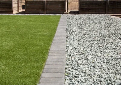 Turf pavers and river rock landscaping